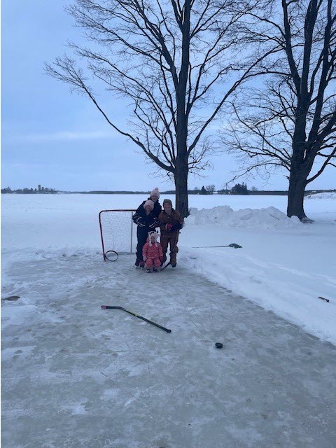 Fraser girls on homemade ice rink