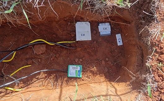 Soil sensors are usually installed in the sidewalls of soil pits so that the soil moisture estimate is from an undisturbed volume. Here several different sensors are installed at a depth of 20cm from the soil surface