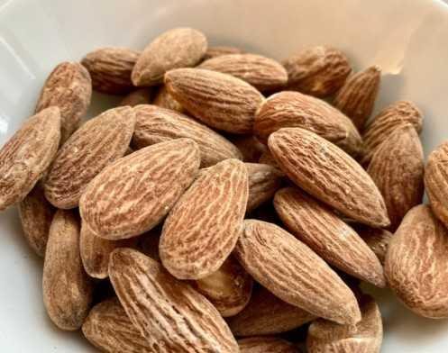 Dry roasted almonds in a bowl