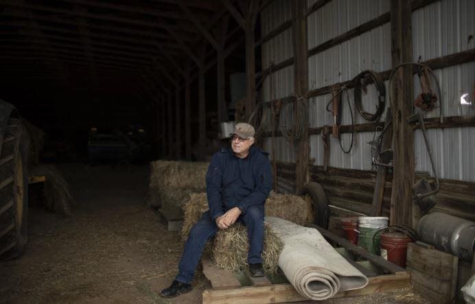 Along the road by Houser's property, signs were still up in December saying solar doesn't belong there. "I find it funny that the signs say 'No solar on our farmland,'" Houser says. "I've asked a couple of [opponents] if they'd like to come help make hay in June, and none of them have volunteered to come help with their farmland."
