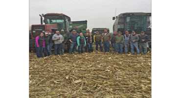 Iowa farming community helps family complete harvest