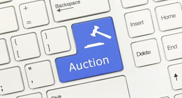 Deere tractor tops BigIron auction