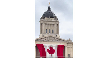 Manitoba Premier Wab Kinew Flies the Canadian Flag in Reaction to U.S. tariffs