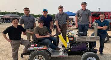 9. Students build tractor from scratch