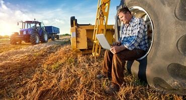 Farmer on laptop