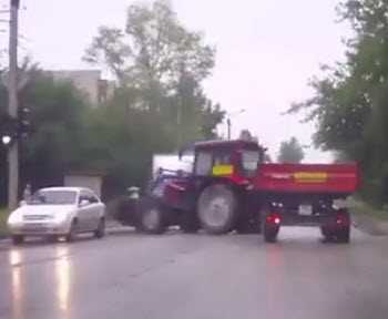 Tractor Hits Car While Turning Corner