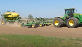 John Deere 9510R Tractor Planting Soy...