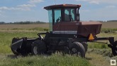 Our new to us 605K plus cutting hay g...