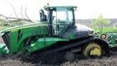 Jim got fired after getting the JD stuck in the mud!