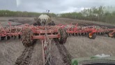 Seeding the north farm in the mud