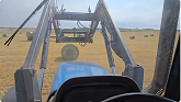 Picking And Wrapping Barley Bales