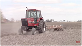 INTERNATIONAL 3288 Tractor Working on Spring Tillage