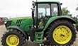John Deere 8850 Tractor Stuck in Muddy Field in North Dakota Pulled Out by Another 8850