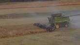  3 John Deere Combines Harvesting Canola