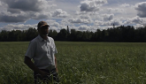 Ontario Dairy Producer Ron Toonders in RC Chippewa Switchgrass Field