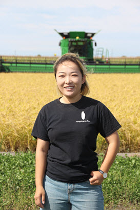 Wendy Zhang in rice field