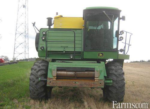 john deere 6620 combine stone trap cover