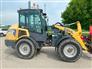 2015 Gehl AL650 Backhoe and Loader