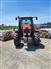 Kubota M135GX cab tractor with front and rear weights