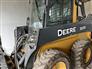 John Deere 2015 320E Skid Steers