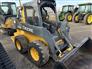 John Deere 2015 320E Skid Steers